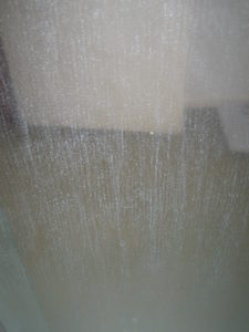 Soap scum in shower glass