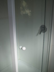 Soap Scum removed from shower glass and looking new again